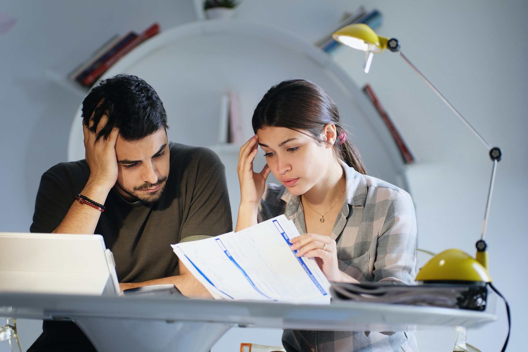 Man and Woman Worried For Taxes And Family Budget